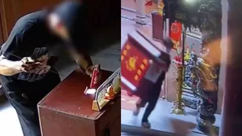 小伙偷功德箱